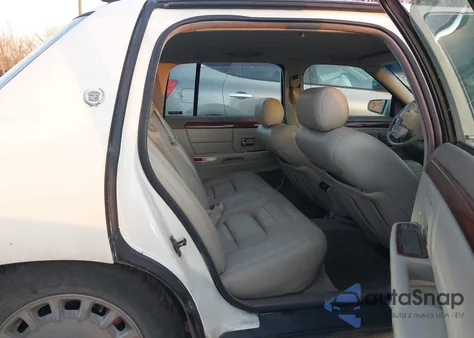 1997 Cadillac Deville Standard z USA, uszkodzony, nr VIN 1G6KD54Y3VU279294